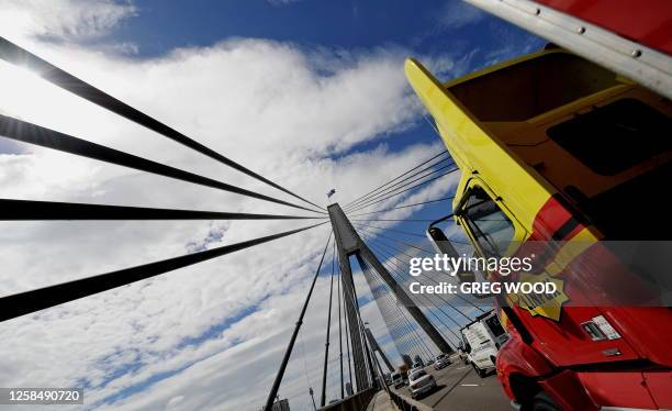 Traffic rides across the Anzac Bridge in Sydney on March 8 the longest concrete cable-stayed span bridge in Australia. AFP PHOTO/GREG WOOD