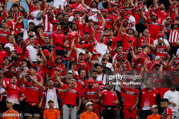 Fans of Wydad AC before the CAF Champions League final football match between Egypt's Al-Ahly and Morocco's Wydad AC at the Cairo International...