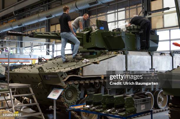 Repair/modernization of the infantry fighting vehicle Puma in a production hall of the armaments group Rheinmetall AG on June 06, 2023 in Unterluess,...