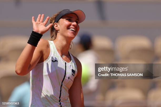 Brazil's Beatriz Haddad Maia waves as she celebrates her victory over Tunisia's Ons Jabeur during their women's singles quarter final match on day...