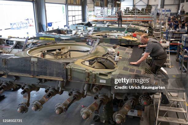 Repair and modernization of the main battle tank Leopard 2A4 in a production hall of the armaments group Rheinmetall AG for further processing on...