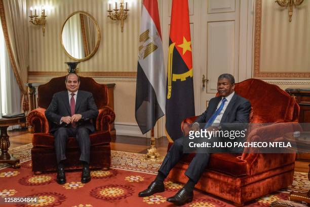Angola President Joao Lourenco and Egyptian President Abdel Fattah al-Sisi are seen in Luanda on June 7, 2023 at the start of their meeting.
