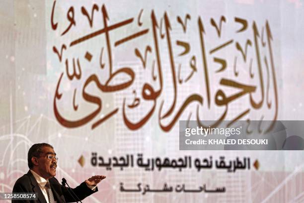 Egypt's General Coordinator of the National Dialogue Diaa Rashwan addresses the representatives of syndicates, political forces, and NGOs during a...
