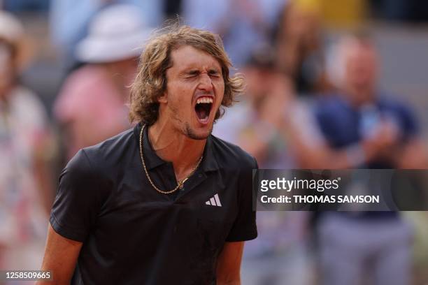 Germany's Alexander Zverev shouts as he celebrates his victory over Argentina's Tomas Martin Etcheverry during their men's singles quarter final...