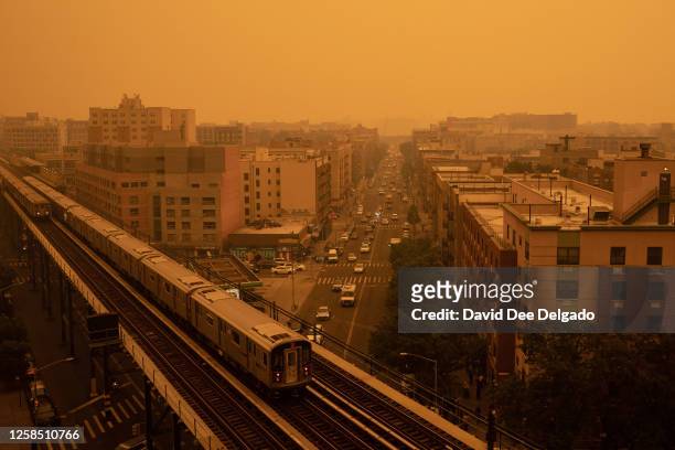 Smoky haze from wildfires in Canada blankets a neighborhood on June 7, 2023 in the Bronx borough of New York City. New York topped the list of most...