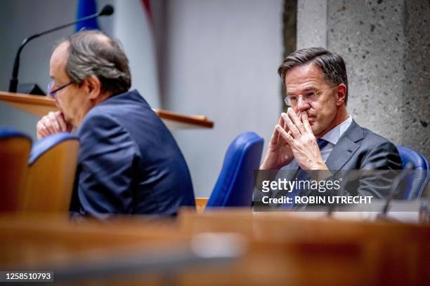 Dutch Prime Minister Mark Rutte and State Secretary for Mining Hans Vijlbrief attend a debate on the report of the Parliamentary Inquiry Committee on...