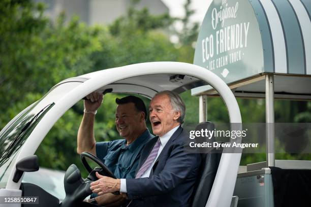 Sen. Ed Markey test drives an electric ice cream truck from Sweet Pea Ice Cream Company during an event showcasing various electric trucks near...