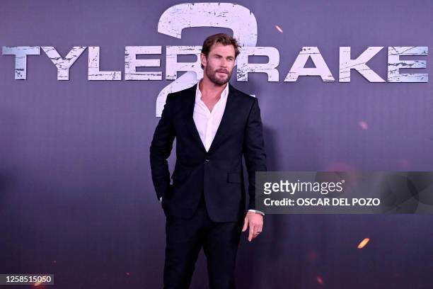 Australian actor Chris Hemsworth poses for a photograph as he arrives to the premiere of Netflix US Serie 'Tyler Rake 2' in Madrid on June 7, 2023.
