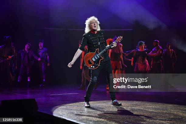 Brian May performs during the finale at the Gala Night performance of "We Will Rock You" at the London Coliseum on June 7, 2023 in London, England.