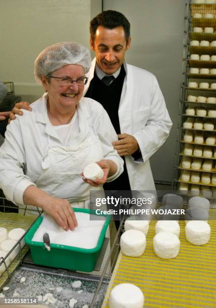 French right-wing presidential candidate Nicolas Sarkozy visits a "Crottin de Chavignol" cheese factory in Chavignol, 26 February 2007, as part of a...