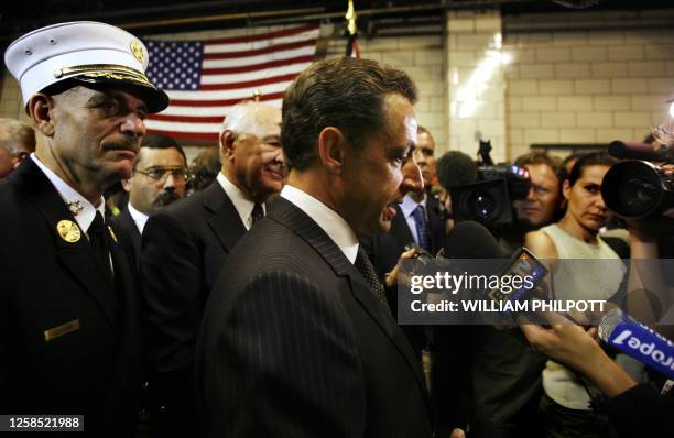 France's Interior Minister Nicolas Sarkozy speaks to the press at Engine 54, Ladder 4 in New York City 10 September 2006. Sarkozy presented the Medal...