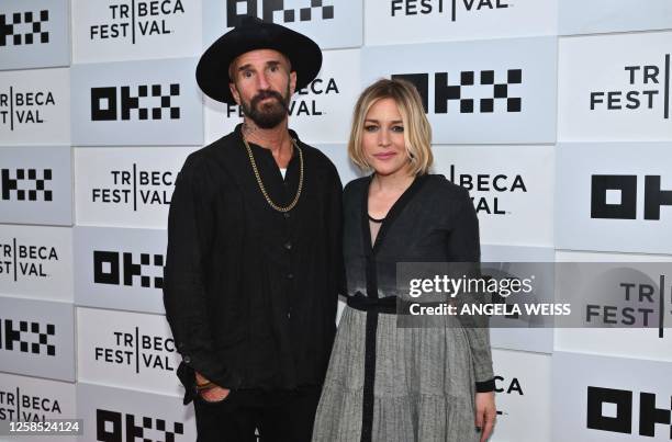 Actress Piper Perabo and her husband actor Stephen Kay arrive to the screening of "Kiss the Future" during the opening night of the Tribeca Film...