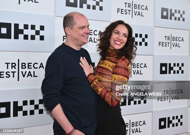 Actress Kate Siegel and husband filmmaker Mike Flanagan arrive to the screening of "Kiss the Future" during the opening night of the Tribeca Film...