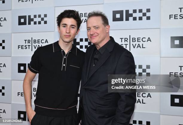 Actor Brendan Fraser and his son Holden Fletcher Fraser arrive to the screening of "Kiss the Future" during the opening night of the Tribeca Film...