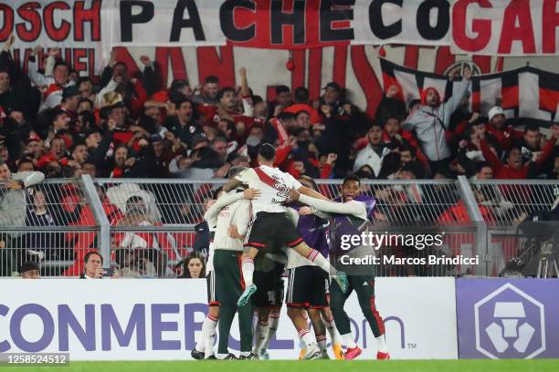 Players of River Plate celebrate the team's first goal scored by Lucas Beltran during a Copa CONMEBOL Libertadores 2023 group D match between River...