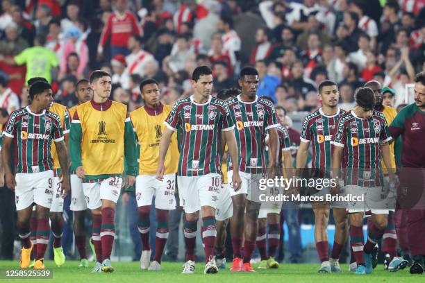 Ganso of Fluminense and teammates leave the field after losing a Copa CONMEBOL Libertadores 2023 group D match between River Plate and Fluminense at...