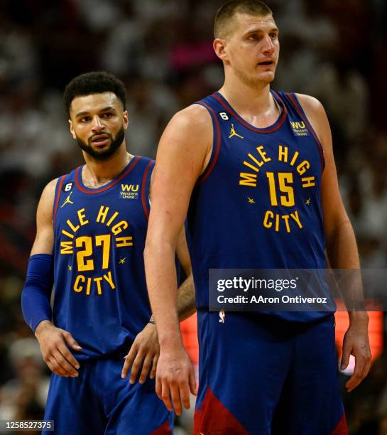 Jamal Murray and Nikola Jokic of the Denver Nuggets lead in the fourth quarter of the Nuggets' 104-94 win over the Miami Heat during Game 3 of the...