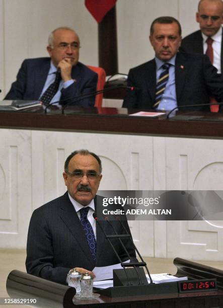 Turkey's Interior Minister Besir Atalay addresses the members of parliament during a debate at the Turkish Parliament, on November 13, 2009 in...