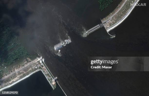 Maxar satellite imagery of the before/after close-up views of Nova Kakhovka dam and hydroelectric power facility. Please use: Satellite image 2023...