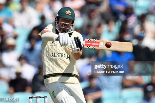 Australia's Travis Head plays a shot during day 2 of the ICC World Test Championship cricket final match between Australia and India at The Oval, in...