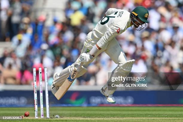 Bails fly as Australia's Mitchell Starc is run out to lose his wicket for five runs during day 2 of the ICC World Test Championship cricket final...