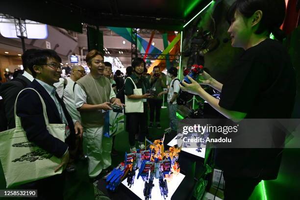 People attend the International Tokyo Toy Show at the Tokyo Big Sight convention center in Tokyo, Japan, on June 8 which is held for four days from...