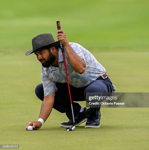 Aman Raj of India lines before plays his fourth shot on the 8th hole ...