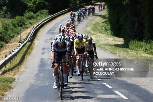 Yellow jersey, UAE Team Emirates' Danish rider Mikkel Bjerg rides in the pack during the fifth stage of the 75th edition of the Criterium du Dauphine...
