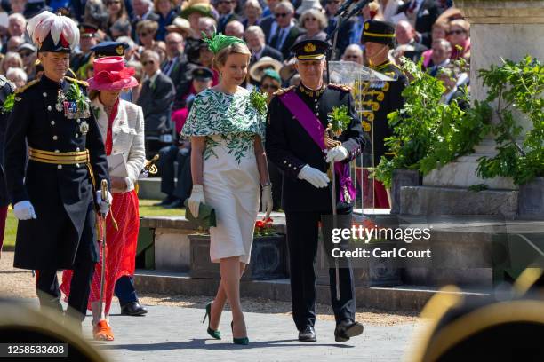 Queen Mathilde and King Philippe of Belgium walk to meet Chelsea Pensioners on Founders Day at the Royal Hospital Chelsea on June 8, 2023 in London,...