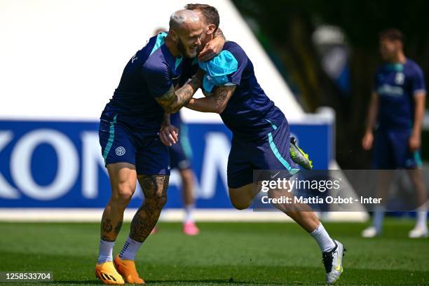 Federico Dimarco of FC Internazionale, Nicolò Barella of FC Internazionale in action during the FC Internazionale training session at the club's...