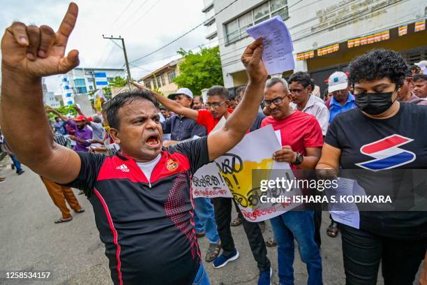 Anti-government demonstrators protest as they urge to hold local elections, near the Elections Secretariat in Colombo on June 8, 2023.