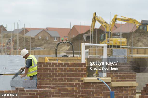 New build houses on the City Fields development under construction in Wakefield, UK, on Thursday, June 8, 2023. UK house prices posted their first...