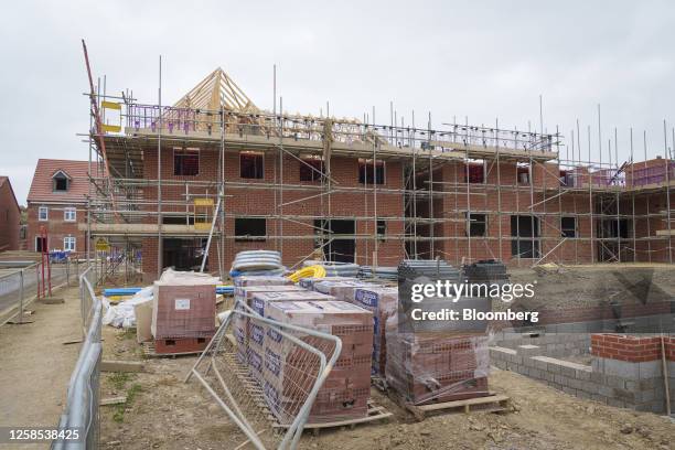 New build houses on the City Fields development under construction in Wakefield, UK, on Thursday, June 8, 2023. UK house prices posted their first...