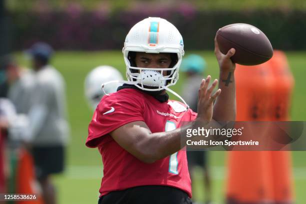 Miami Dolphins quarterback Tua Tagovailoa throws at targets during the Miami Dolphins OTA on Thursday, June 8, 2023 at Baptist Health Training...
