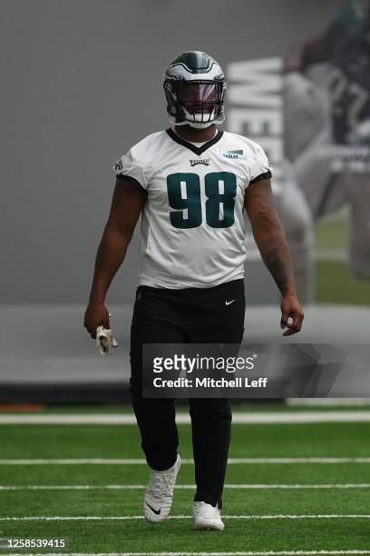 Jalen Carter of the Philadelphia Eagles warms up during OTAs at the NovaCare Complex on June 8, 2023 in Philadelphia, Pennsylvania.