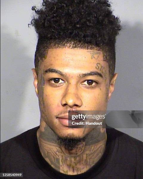 In this handout photo provided by the Las Vegas Metropolitan Police Department, Johnathan Jamall Porter, a.k.a. Blueface, is seen in a booking photo...