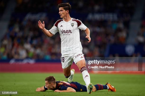 Riki of Albacete Balompie in action next to Jorge de Frutos of Levante UD during the LaLiga SmartBank Play-off Semifinal Second Leg match between...