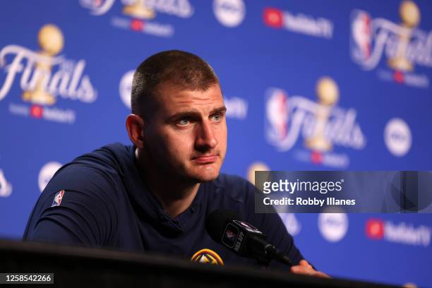 Nikola Jokic of the Denver Nuggets talks to the media during 2023 NBA Finals Practice and Media Availability on June 8, 2023 at the Kaseya Center in...