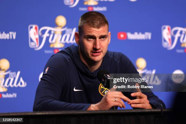 Nikola Jokic of the Denver Nuggets talks to the media during 2023 NBA Finals Practice and Media Availability on June 8, 2023 at the Kaseya Center in...