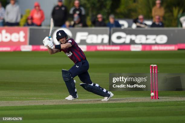 Joe Denly Kent cricket batsman hits a run during the Vitality T20 Blast match between Kent County Cricket Club and Essex at the St Lawrence Ground,...