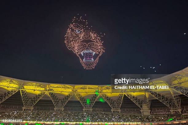 Fans watch fireworks at Al-Ittihad's stadium in Jeddah during a ceremony to unveil former Real Madrid striker Karim Benzema, on June 8, 2023. Benzema...