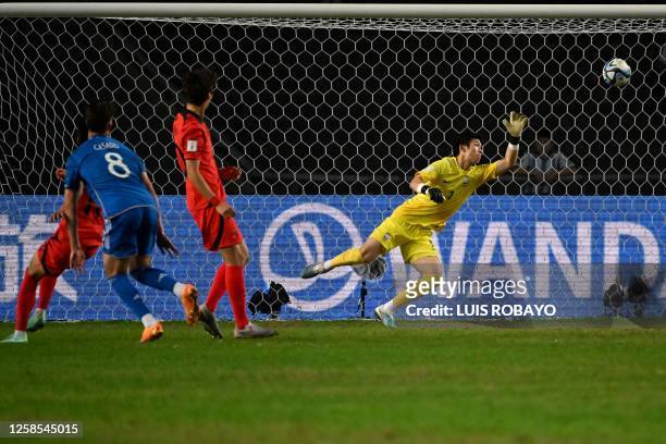 South Korea's goalkeeper Kim Joon-hong can't keep out a goal scored by Italy's midfielder Cesare Casadei during the Argentina 2023 U-20 World Cup...