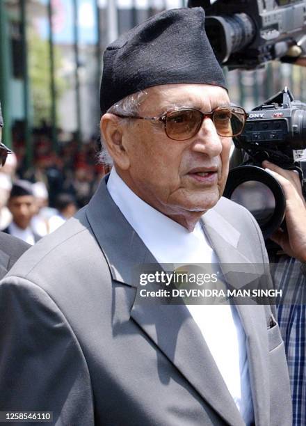 Nepalese Prime Minister Girija Prasad Koirala leaves the venue after delivering a speech to the nation to mark "Democracy Day" in Kathmandu 24 April...