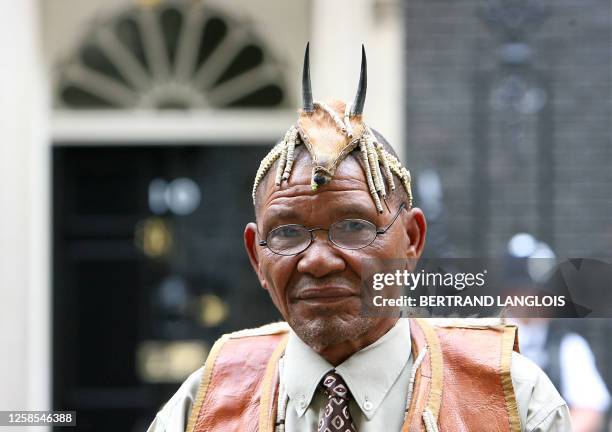 Bushman leader Roy Sesana of the Kalahari addresses the media outside N° 10 Downing Street in central London, 24 May 2007, before meeting with...