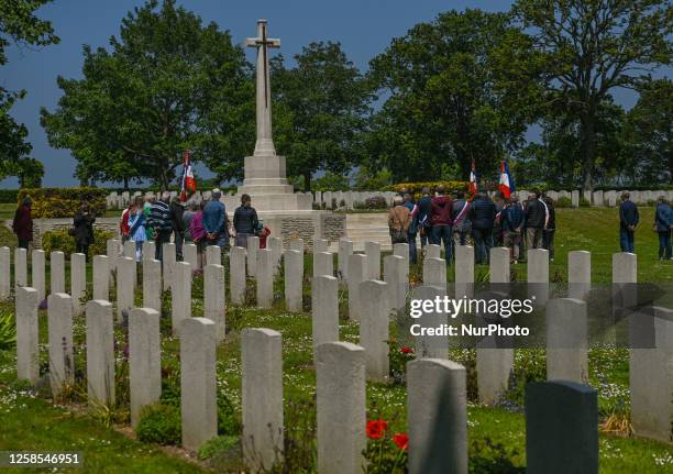 Locals honor fallen soldiers during the 79th Anniversary D-Day Service at Hottot-les-Bagues War Cemetery, in Hottot-les-Bagues, Calvados, France, on...