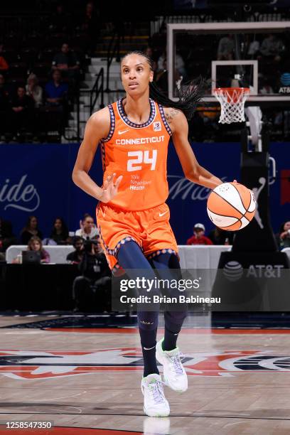 DeWanna Bonner of the Connecticut Sun dribbles the ball during the game against the Las Vegas Aces on June 8, 2023 at the Mohegan Sun Arena in...