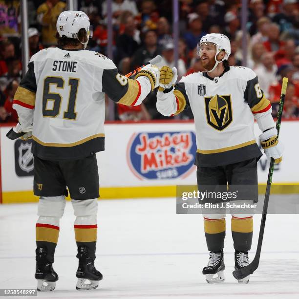 Jonathan Marchessault of the Vegas Golden Knights celebrates his goal with teammate Mark Stone during the second period against the Florida Panthers...