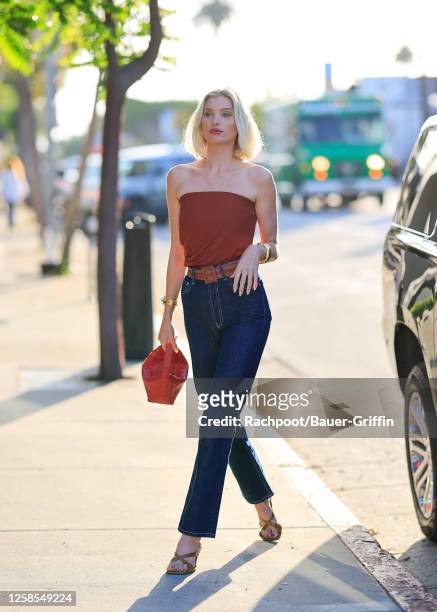 Elsa Hosk is seen arriving to the opening of the FWRD pop up store in West Hollywood on June 08, 2023 in Los Angeles, California.