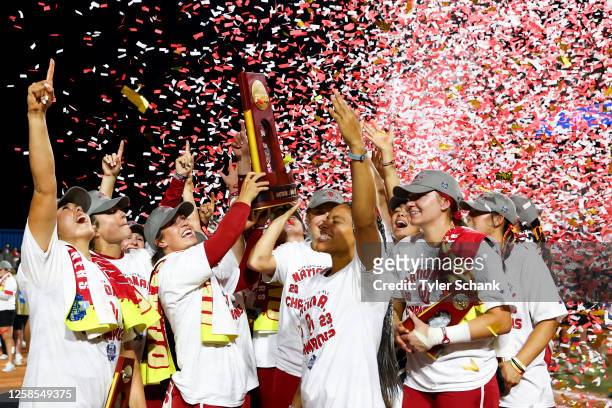 The Oklahoma Sooners celebrate after defeating the Florida State Seminoles in the Division I Women's Softball Championship held at USA Softball Hall...