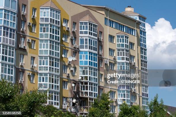 View of a damaged multi-storey apartment building after a reported drone attack in Voronezh on June 9, 2023.